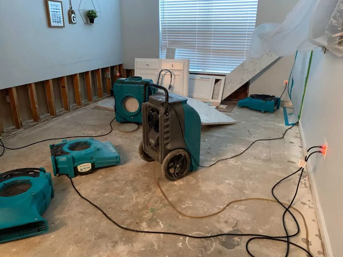Dehumidifier in flood-cut room for Water Damage Restoration in Painesville